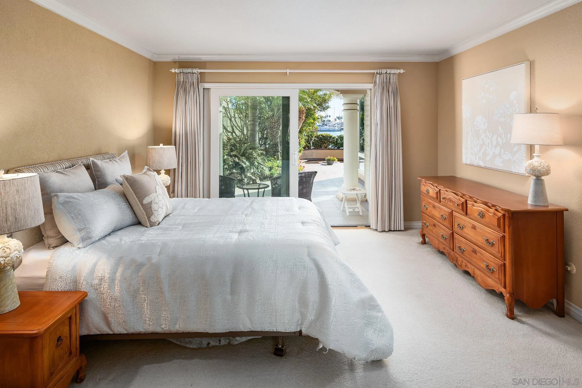 2 The Point Coronado, CA 92118 - Photo 27 of 54 a bed sitting in a bedroom next to a window