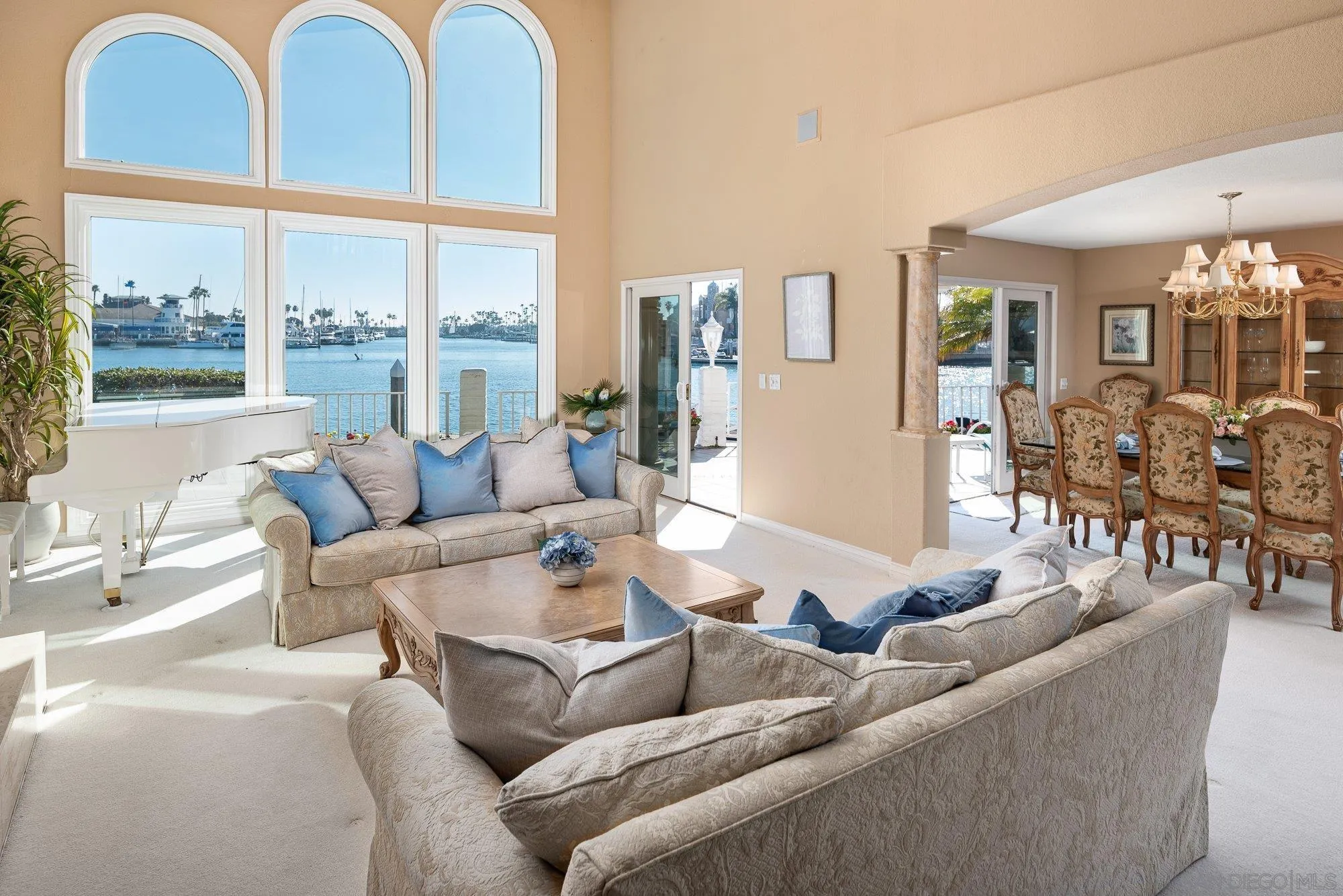 2 The Point Coronado, CA 92118 - Photo 8 of 54 a living room with furniture and a large window