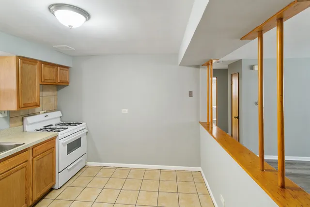a view of a kitchen with electric appliances