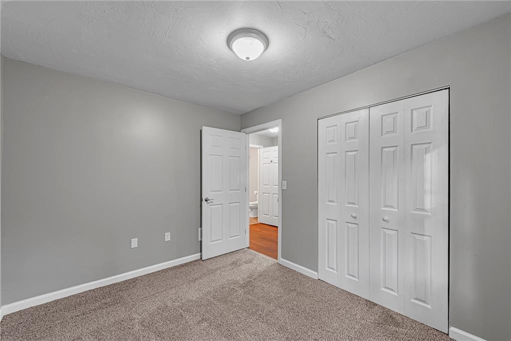 814 Breakneck Road Connellsville, PA 15425 - Photo 12 of 25 an empty room with an entryway