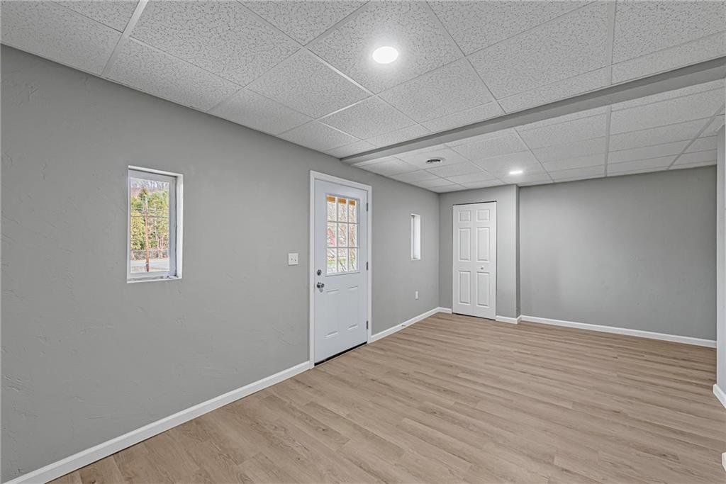 814 Breakneck Road Connellsville, PA 15425 - Photo 20 of 25 a view of an empty room with wooden floor