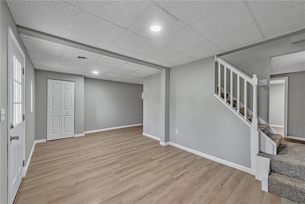814 Breakneck Road Connellsville, PA 15425 - Photo 22 of 25 a view of an empty room with wooden floor