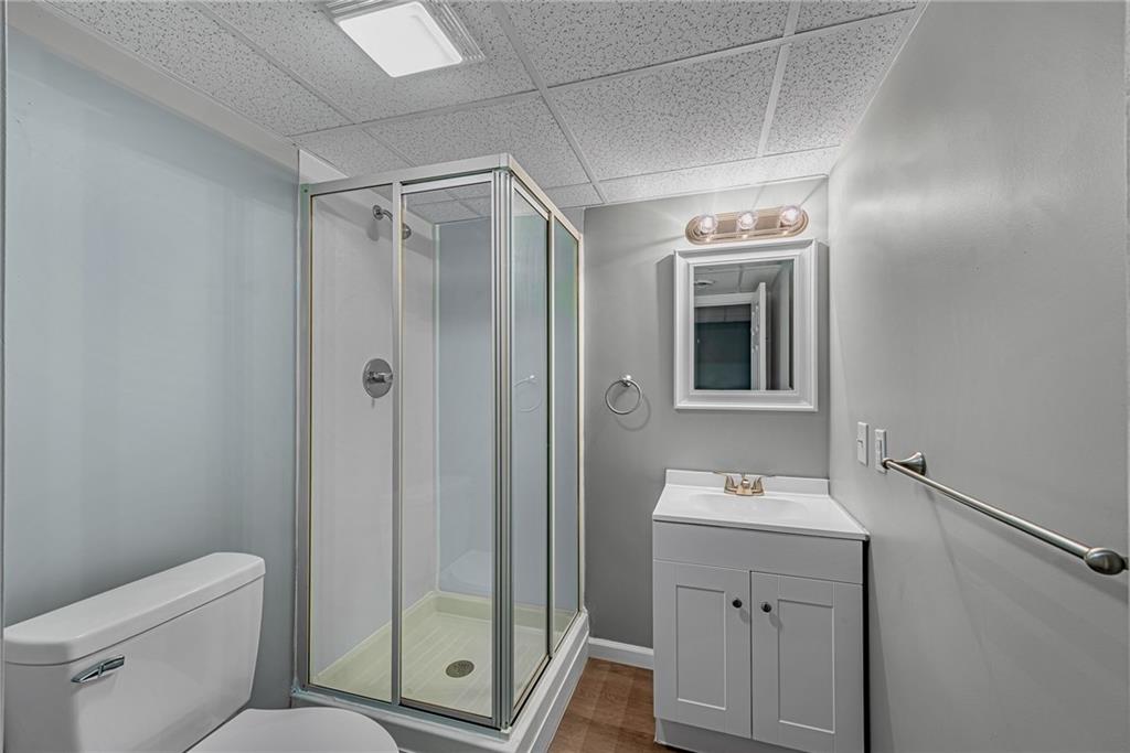 814 Breakneck Road Connellsville, PA 15425 - Photo 24 of 25 a bathroom with a shower a sink and toilet