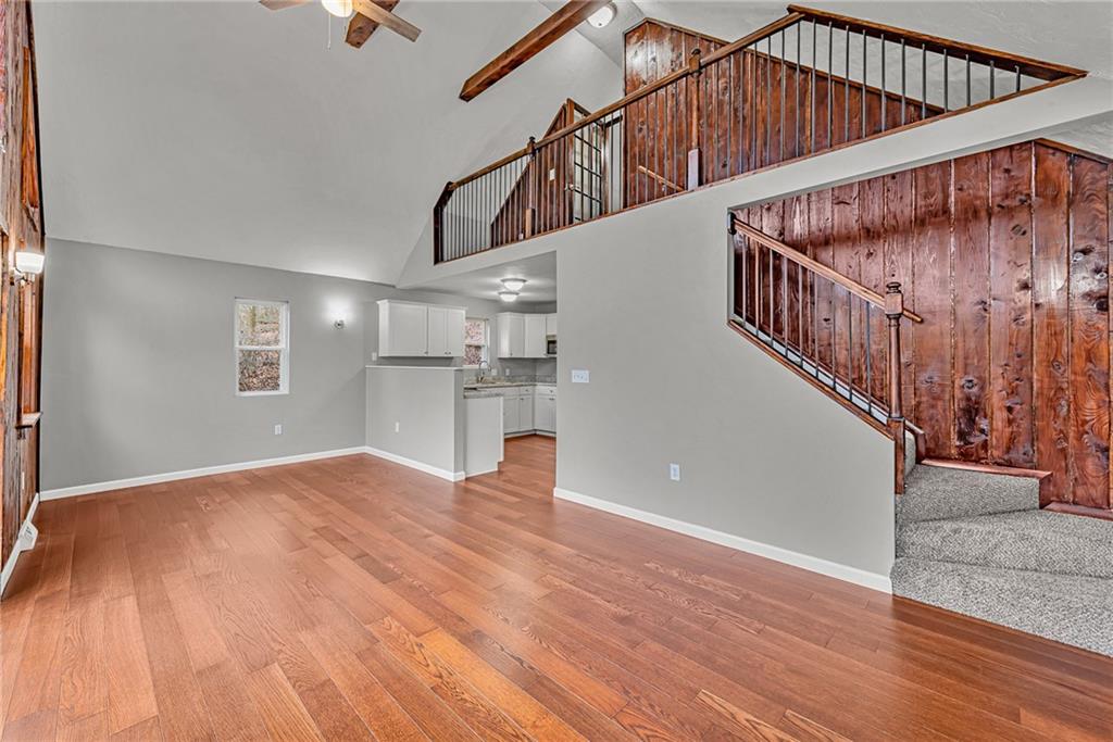 814 Breakneck Road Connellsville, PA 15425 - Photo 6 of 25 a view of entryway and hall with wooden floor