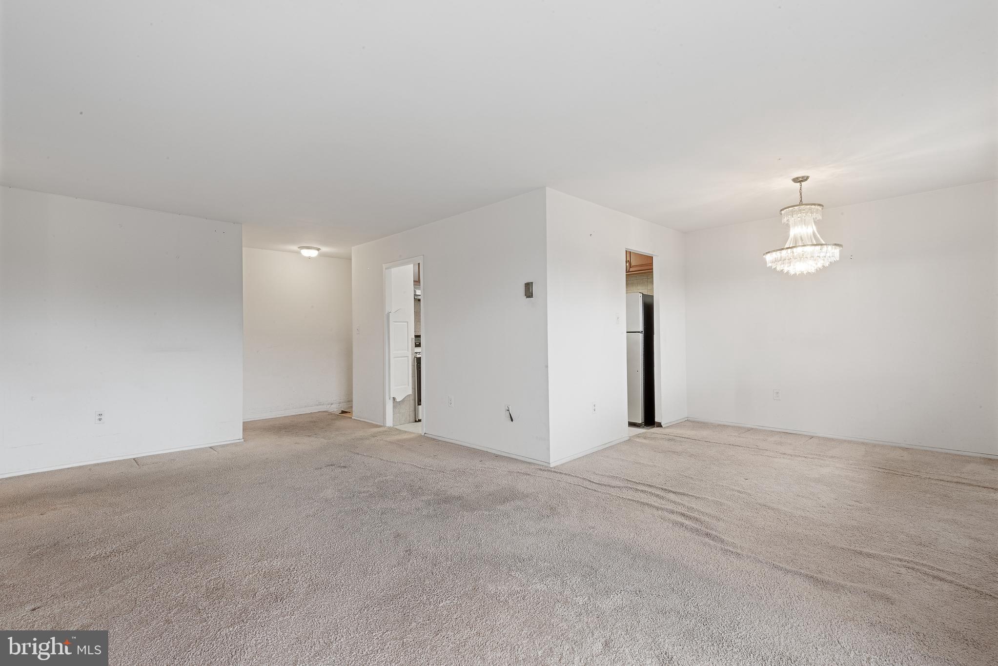 1111 University Boulevard West, Unit 805A Silver Spring, MD 20902 - Photo 20 of 33 an empty room with a bathroom