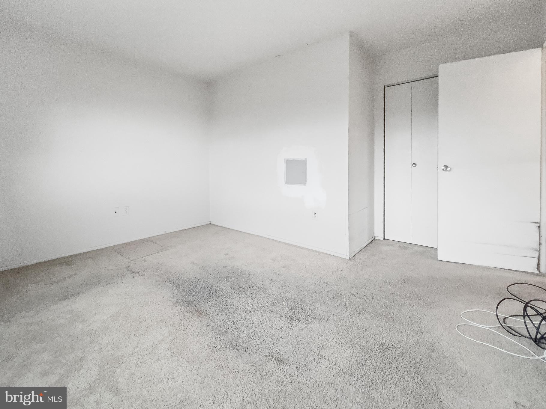 1111 University Boulevard West, Unit 805A Silver Spring, MD 20902 - Photo 22 of 33 a view of a room with white walls