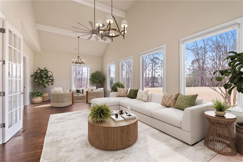 14560 Wood Road Milton, GA 30004 - Photo 22 of 74 a living room with furniture and a large window