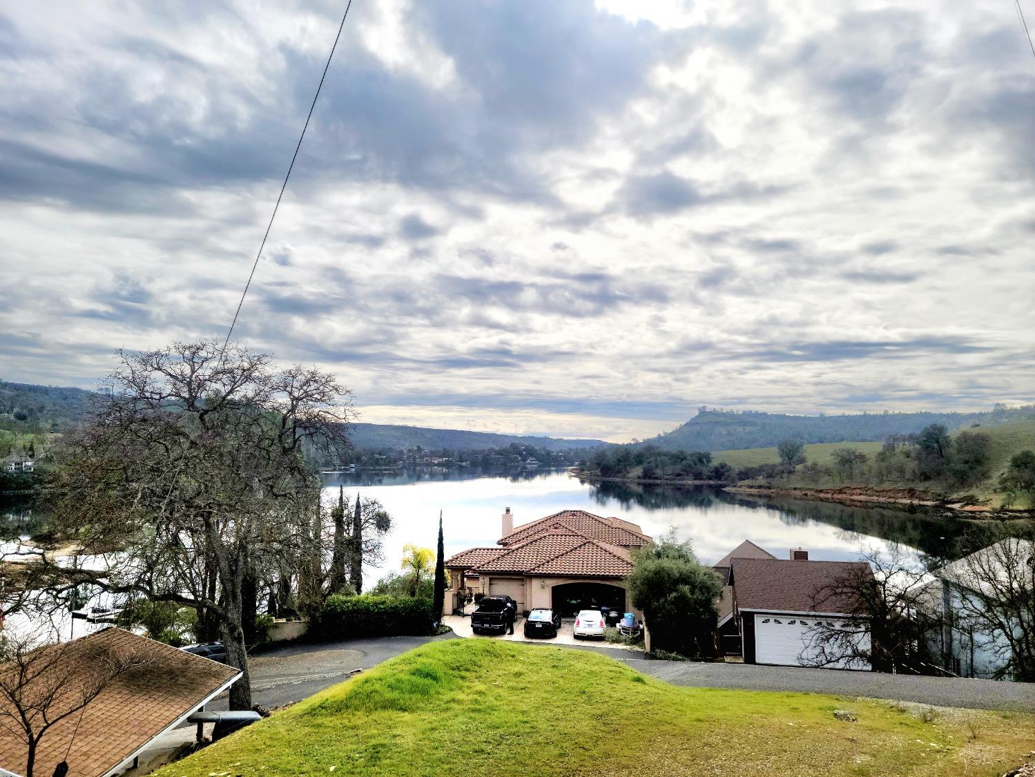 835 Foothill Road Copperopolis, CA 95228 - Photo 4 of 20 a view of a big house with a big yard and large trees