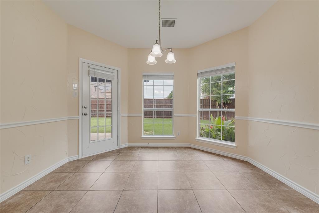 623 Lone Ridge Way Murphy, TX 75094 - Photo 20 of 40 a view of an empty room with a window