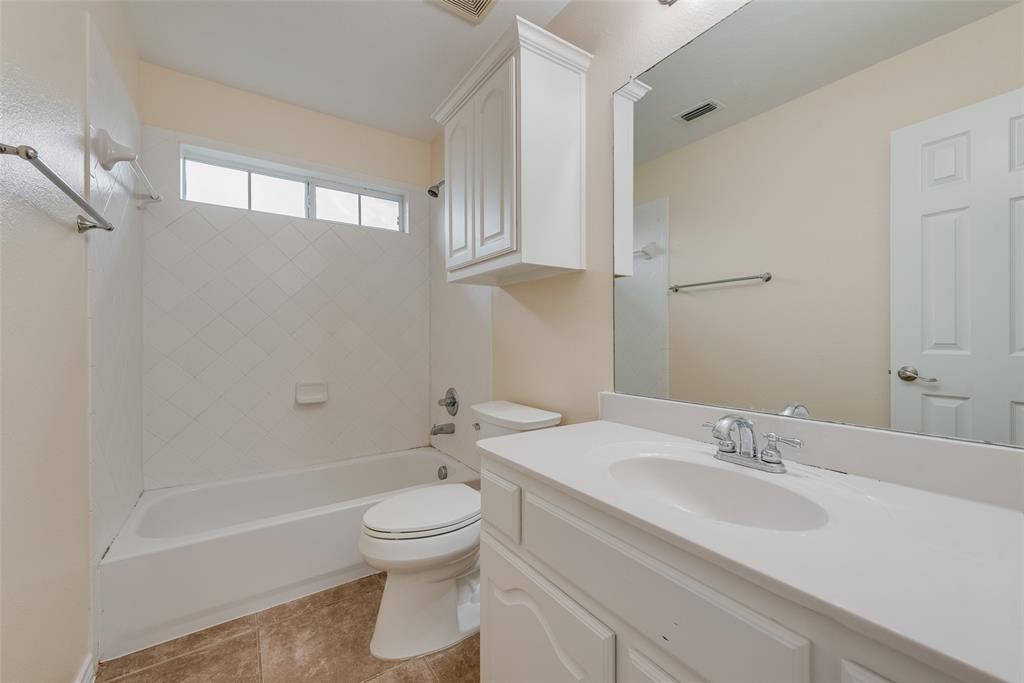 623 Lone Ridge Way Murphy, TX 75094 - Photo 34 of 40 a bathroom with a sink toilet and shower