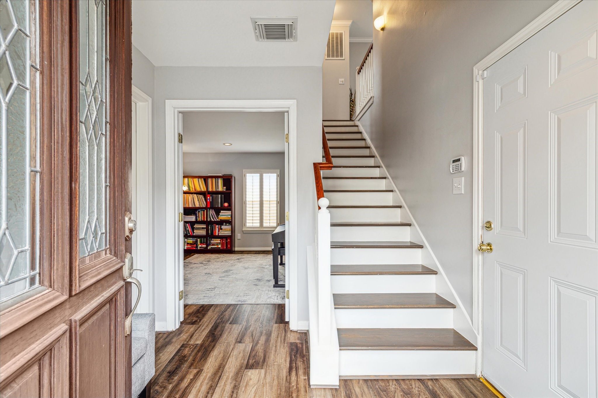 1213 Oneil Street, Unit B Houston, TX 77019 - Photo 3 of 20 a view of a hallway with wooden floor and entryway
