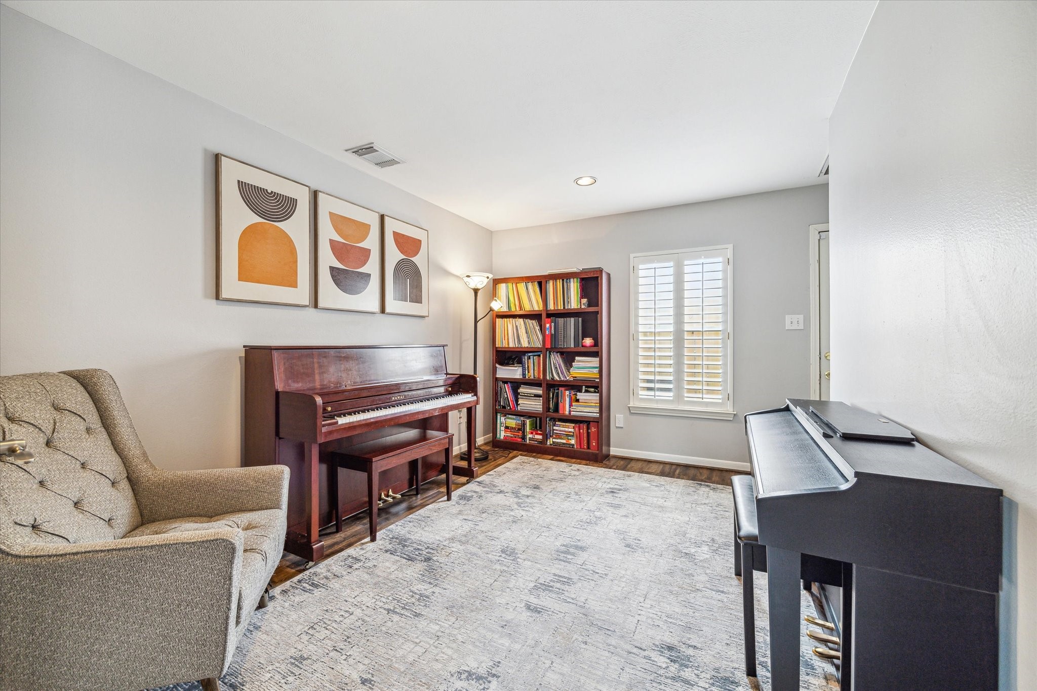 1213 Oneil Street, Unit B Houston, TX 77019 - Photo 5 of 20 a living room with furniture and a flat screen tv