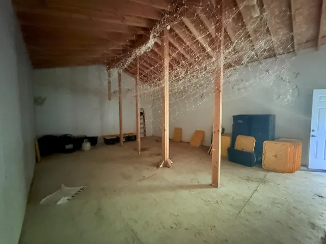 a view of empty room with windows