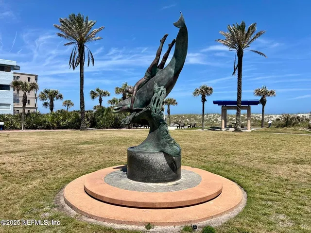 a vase of flowers sitting on a table