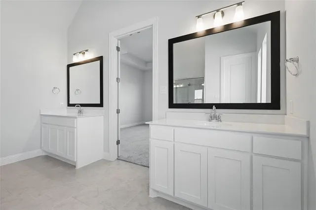 a utility room with washer and dryer