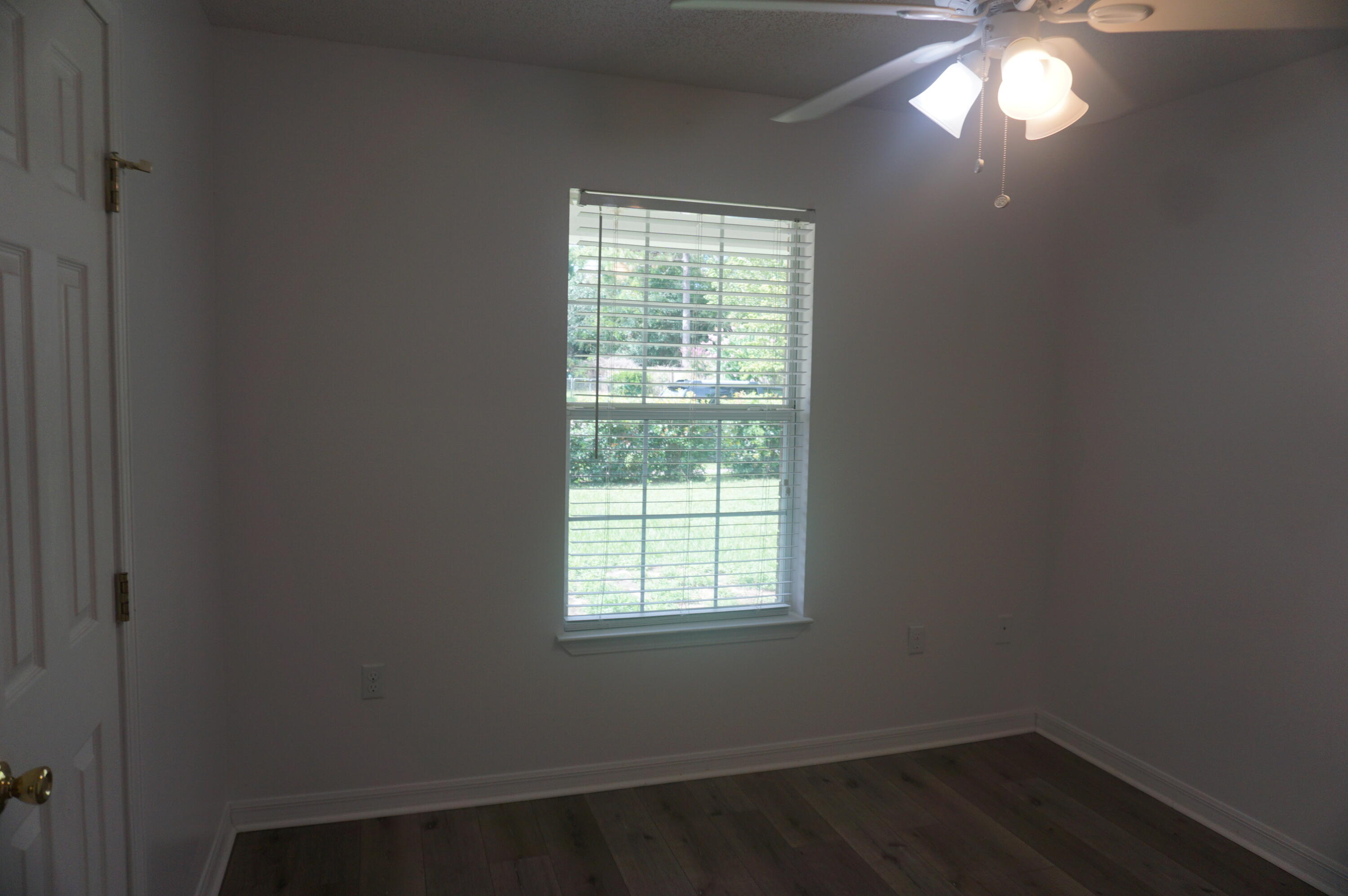 305 Hudson Drive Crestview, FL 32539 - Photo 12 of 16 an empty room with a window