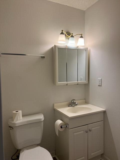 305 Hudson Drive Crestview, FL 32539 - Photo 7 of 16 a bathroom with a sink and mirror