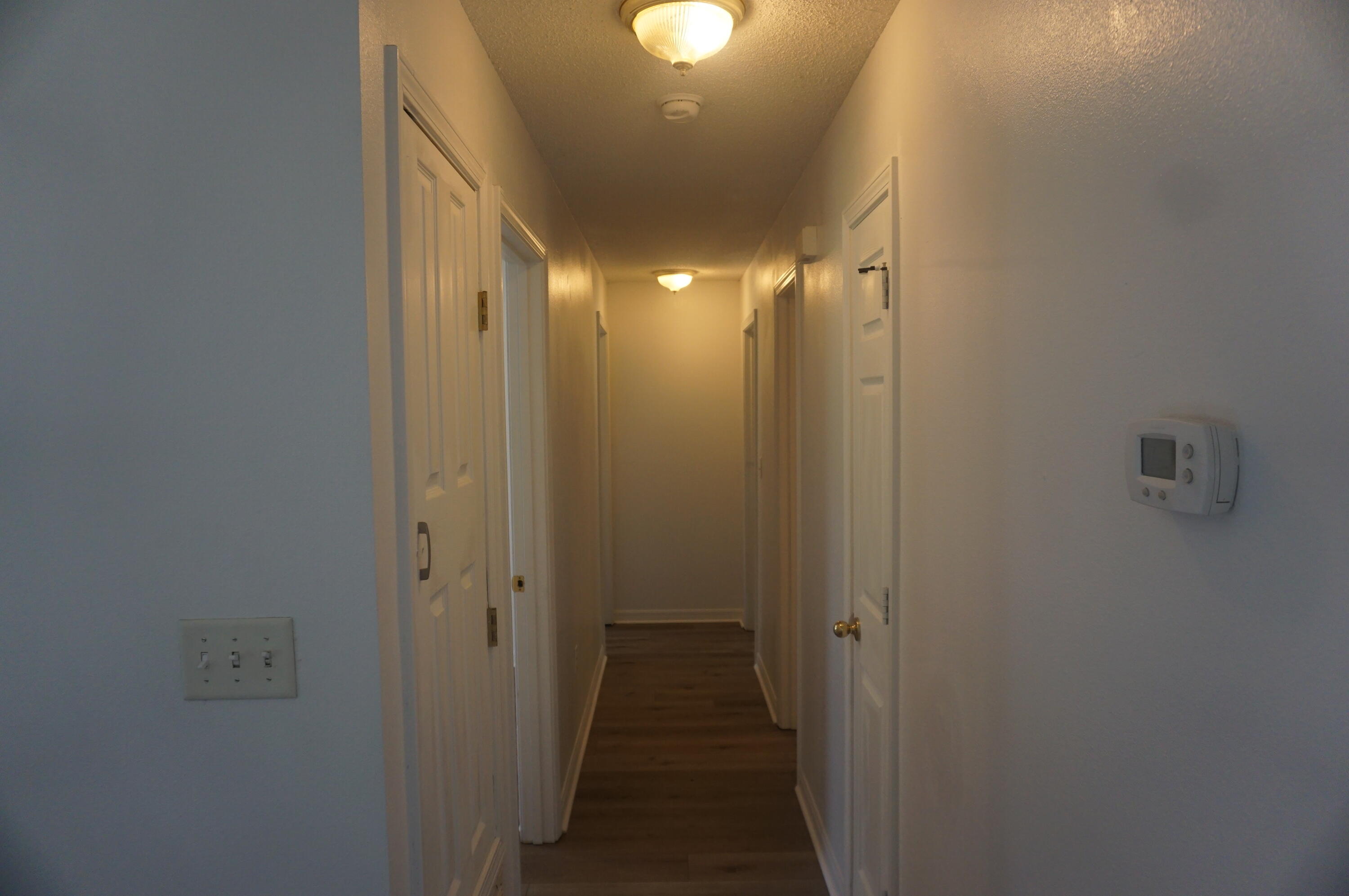 305 Hudson Drive Crestview, FL 32539 - Photo 8 of 16 a view of a hallway