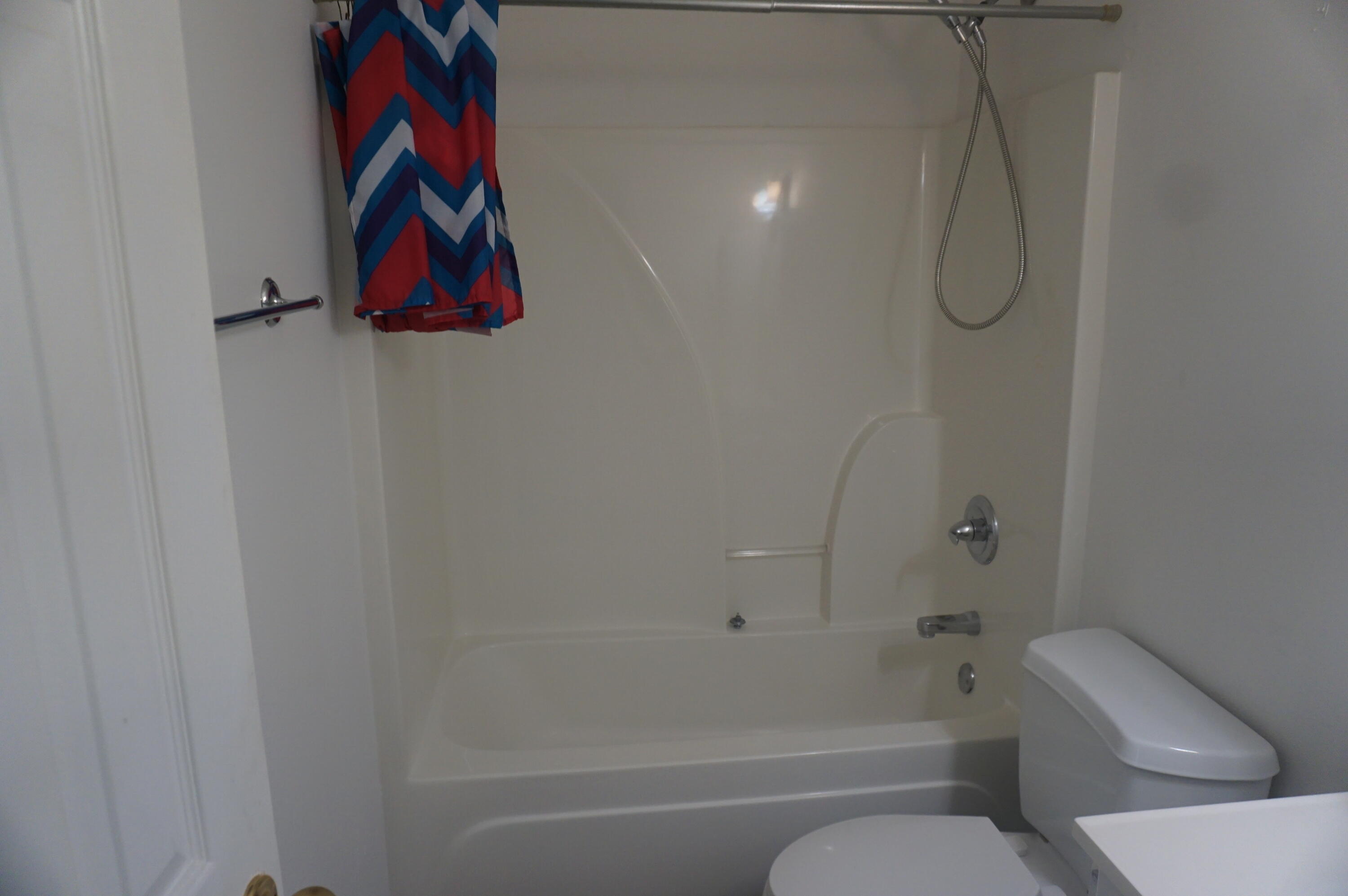 305 Hudson Drive Crestview, FL 32539 - Photo 10 of 16 a bathroom with a toilet and a shower