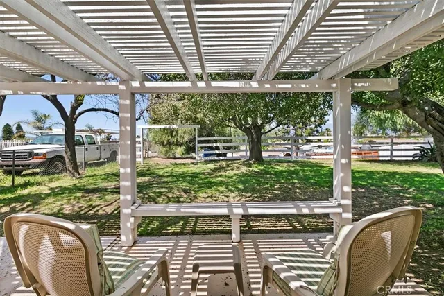 a view of a swimming pool with a patio