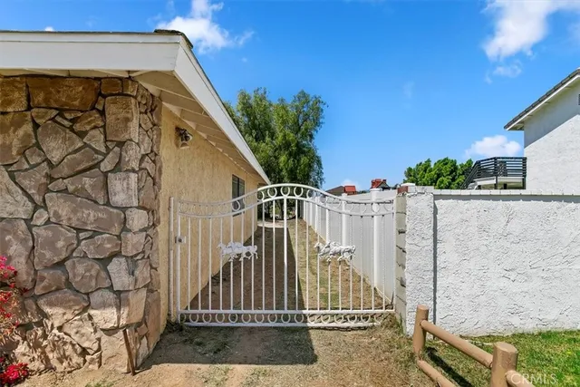 an aerial view of residential houses with outdoor space and swimming pool