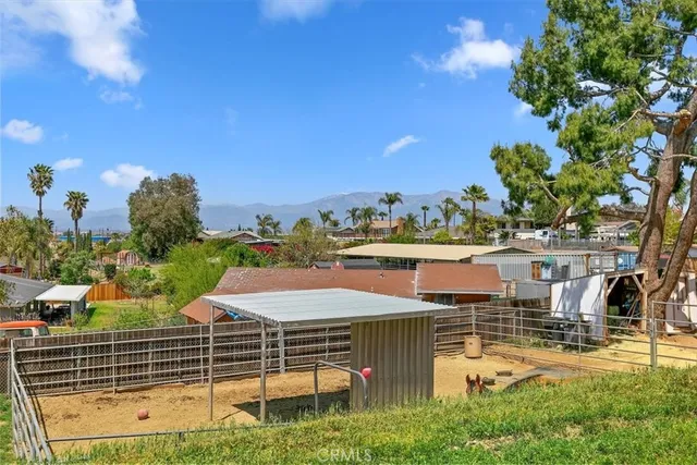 a view of front door and flowers