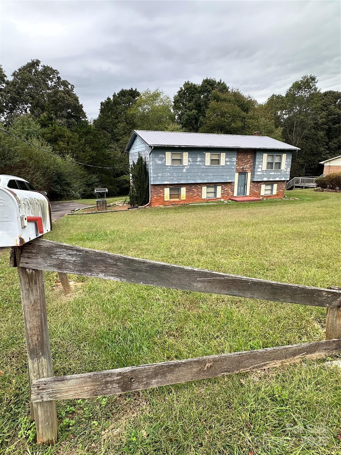 5079 Archdale Drive Conover, NC 28613 - Photo 2 of 30 a front view of a house with a yard