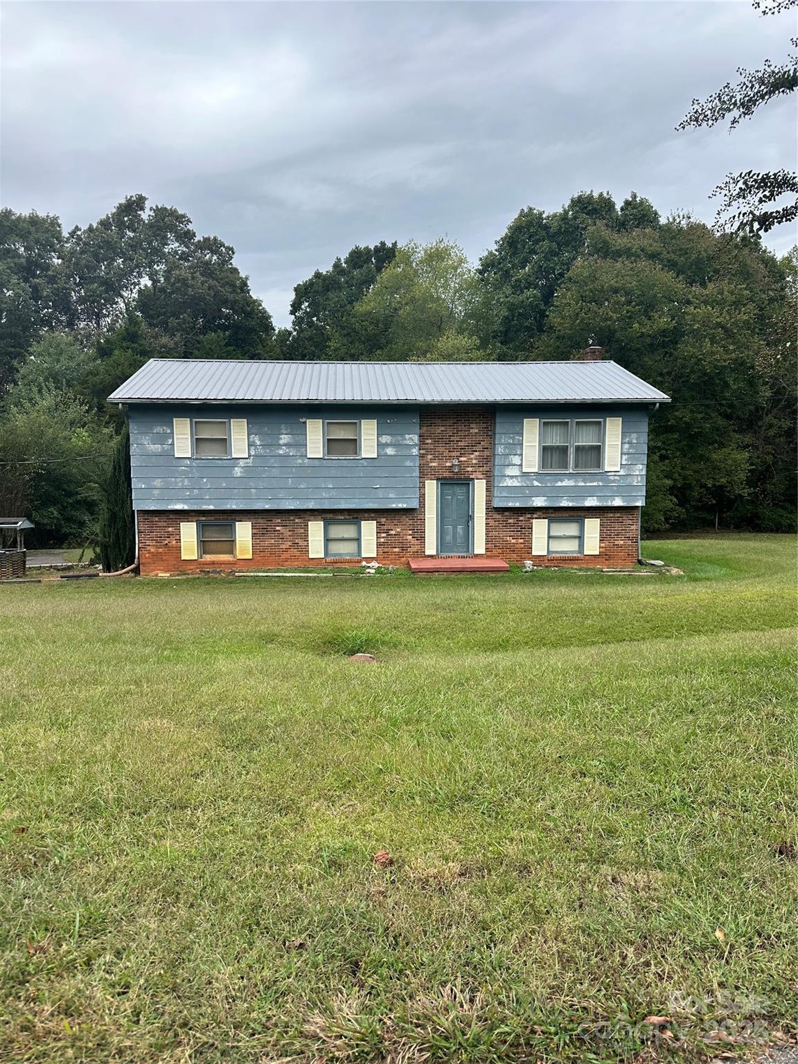 5079 Archdale Drive Conover, NC 28613 - Photo 10 of 30 a front view of a house with a yard