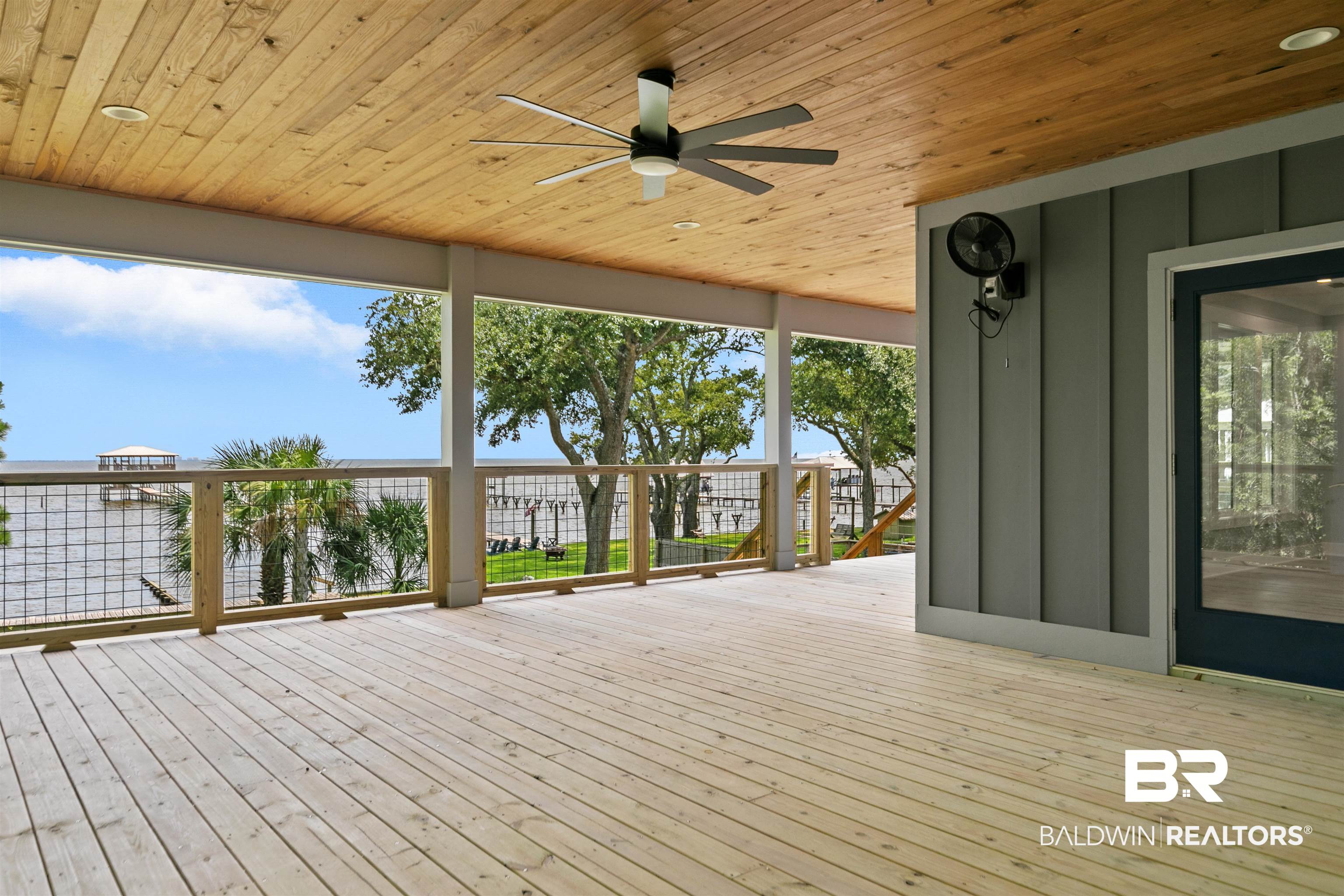 10507 County Road 1 Fairhope, AL 36532 - Photo 30 of 59 Wooden terrace with ceiling fan