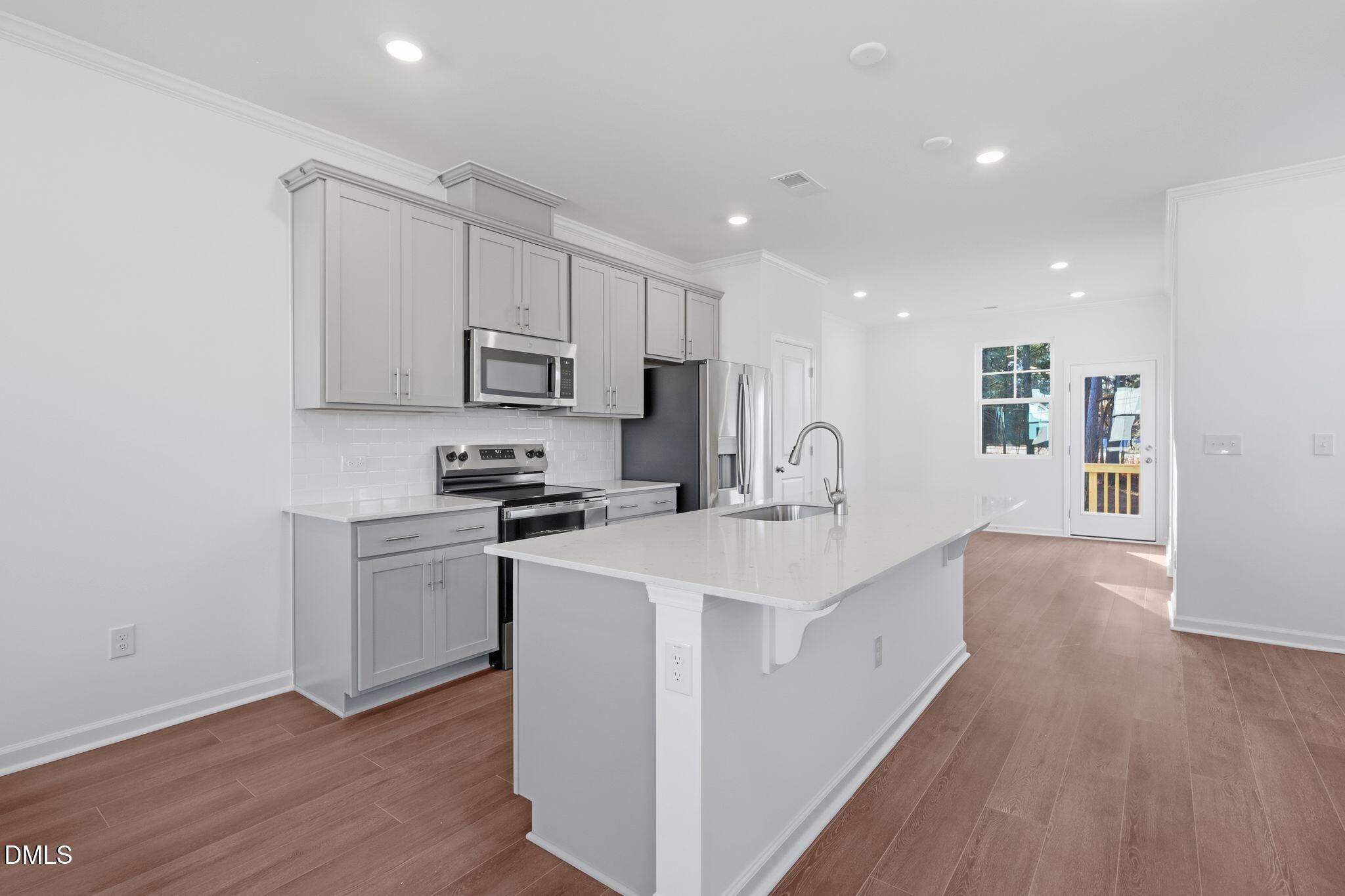 3600 Elm Grv Lane Raleigh, NC 27604 - Photo 5 of 33 SUN_ElmGrove_Pic_Wyatt_QMI_31_Kitchen_1o