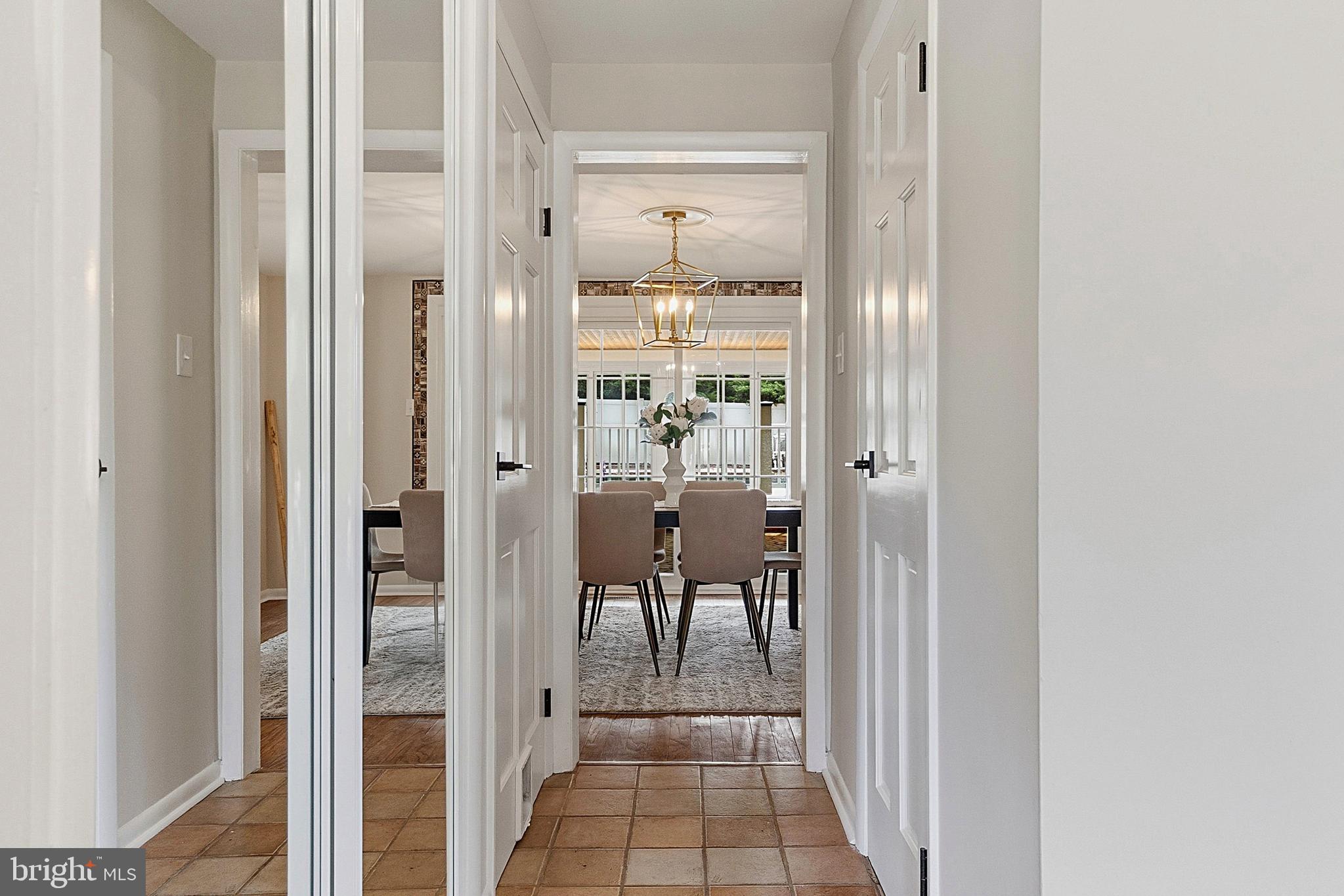 117 Harvest Road Cherry Hill, NJ 08002 - Photo 9 of 35 a view of a hallway with a glass door and a glass door
