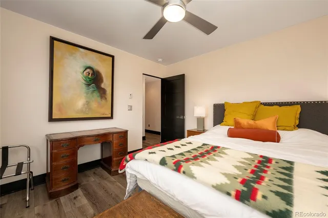 a kitchen with stainless steel appliances kitchen island granite countertop a refrigerator and a stove