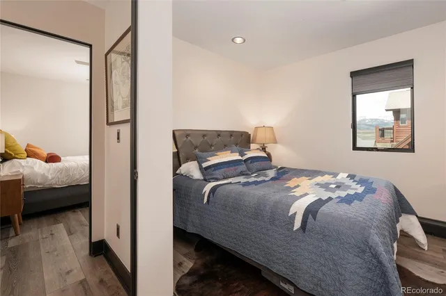a living room with fireplace furniture and a flat screen tv