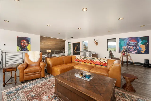 a bathroom with a sink a mirror and shower