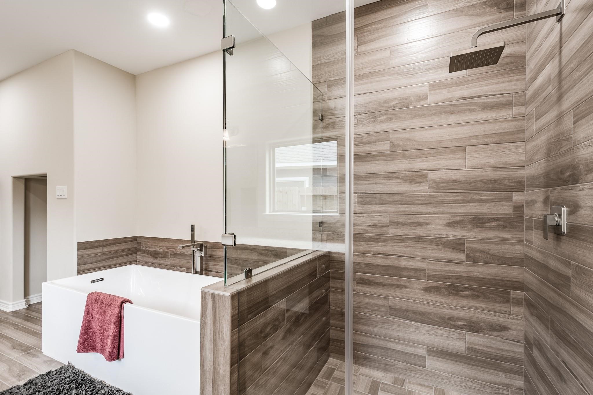 10610 Ellerston Road Cleveland, TX 77327 - Photo 13 of 26 a bathroom with a sink and a shower