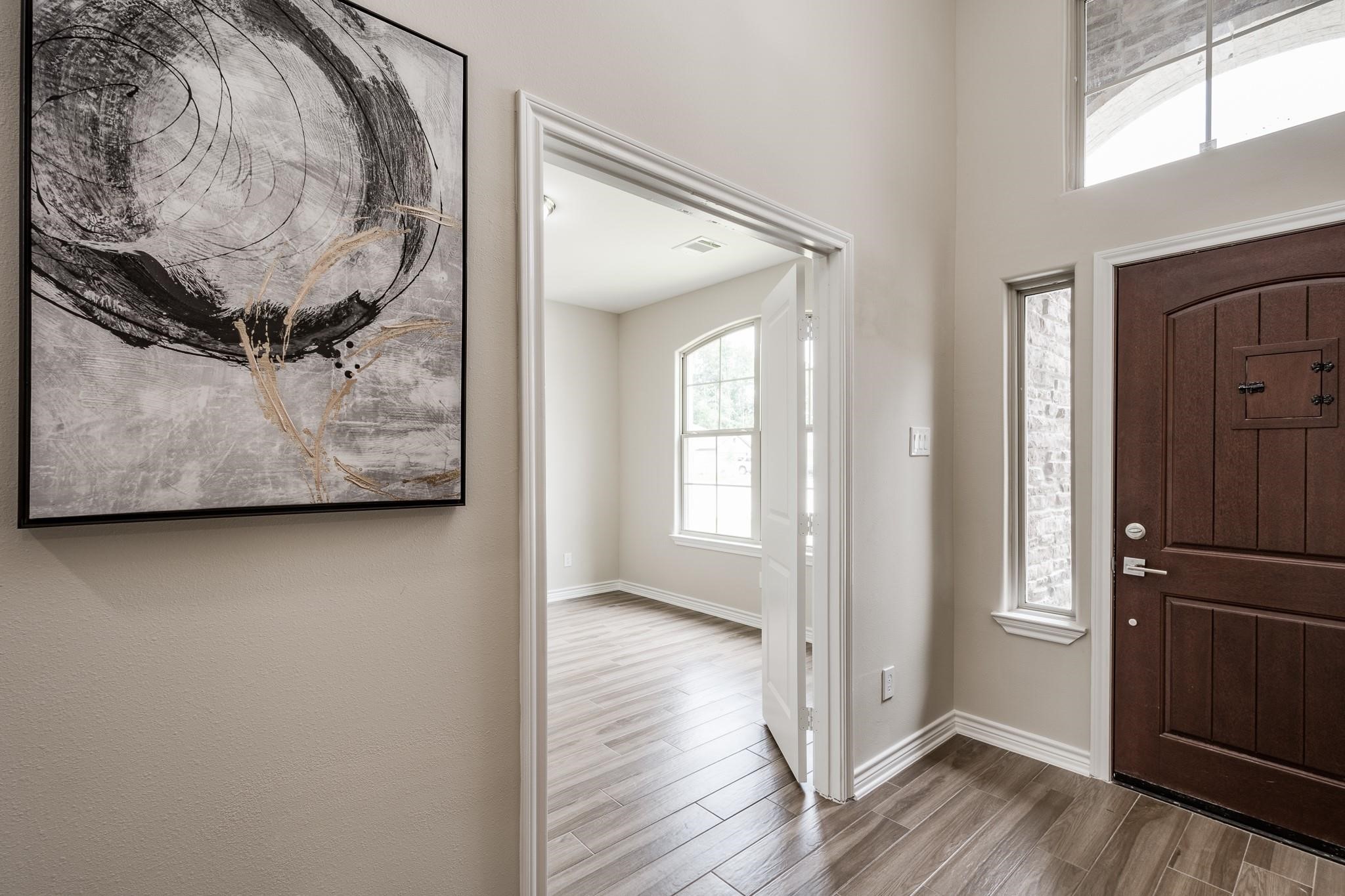 10610 Ellerston Road Cleveland, TX 77327 - Photo 4 of 26 a view of a wooden door