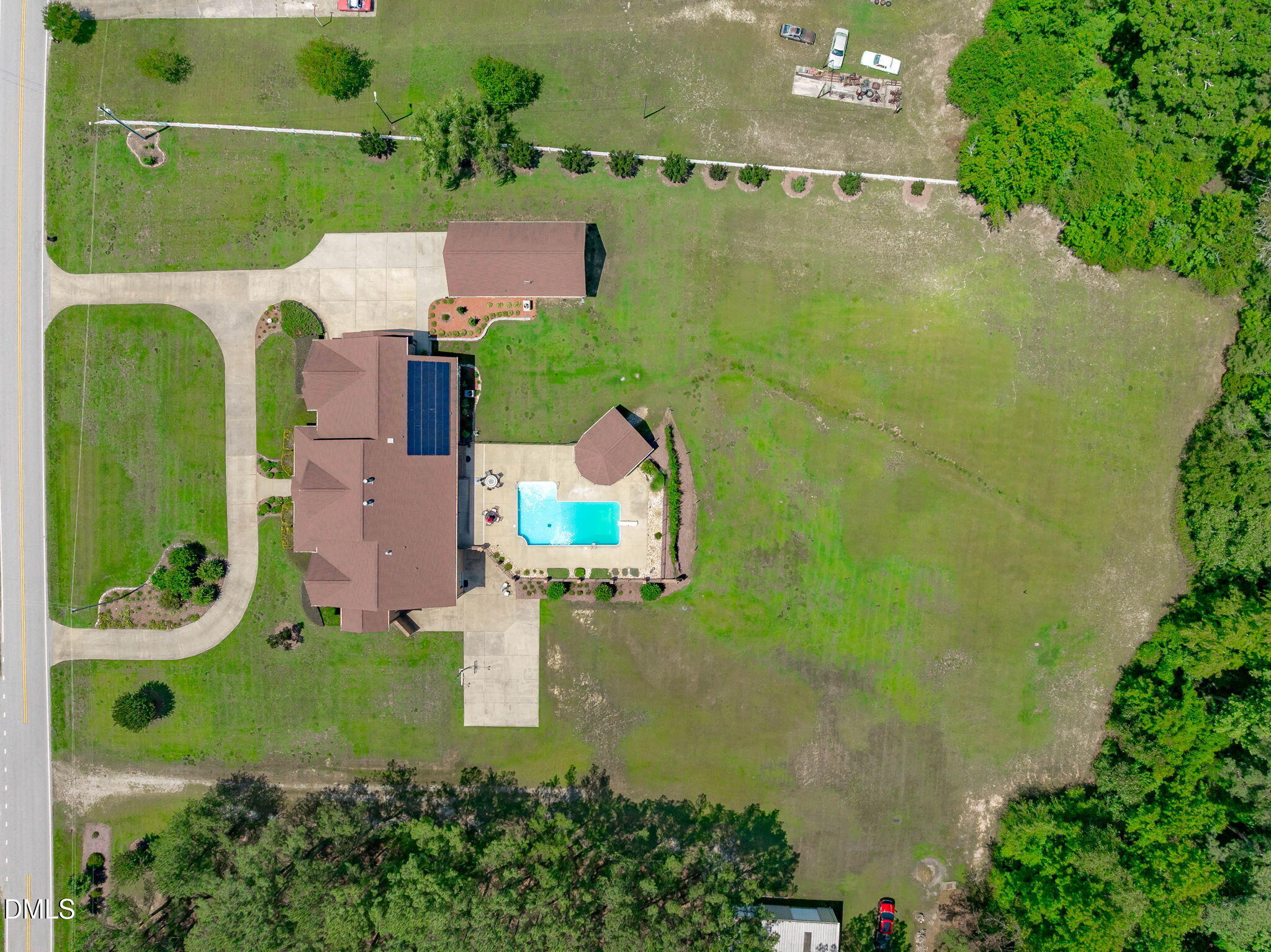 10917 Jordan Road Raleigh, NC 27603 - Photo 57 of 58 an aerial view of a house with a swimming pool