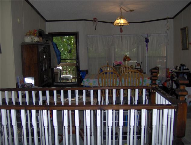 1636 Simmons Ridge Road Cornersville, TN 37047 - Photo 3 of 15 Dinning Room with bay window and door leading to 1 of 3 decks.