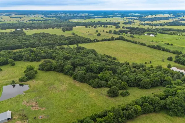 a view of a lake with a houses