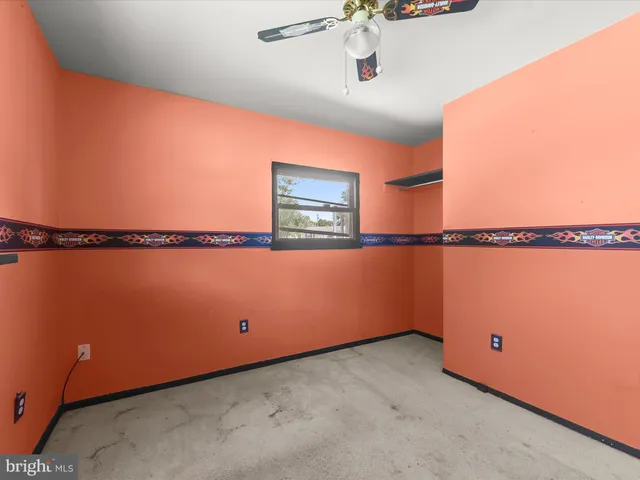 an empty room with bags