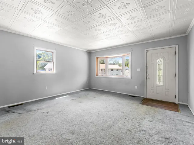 an empty room with windows