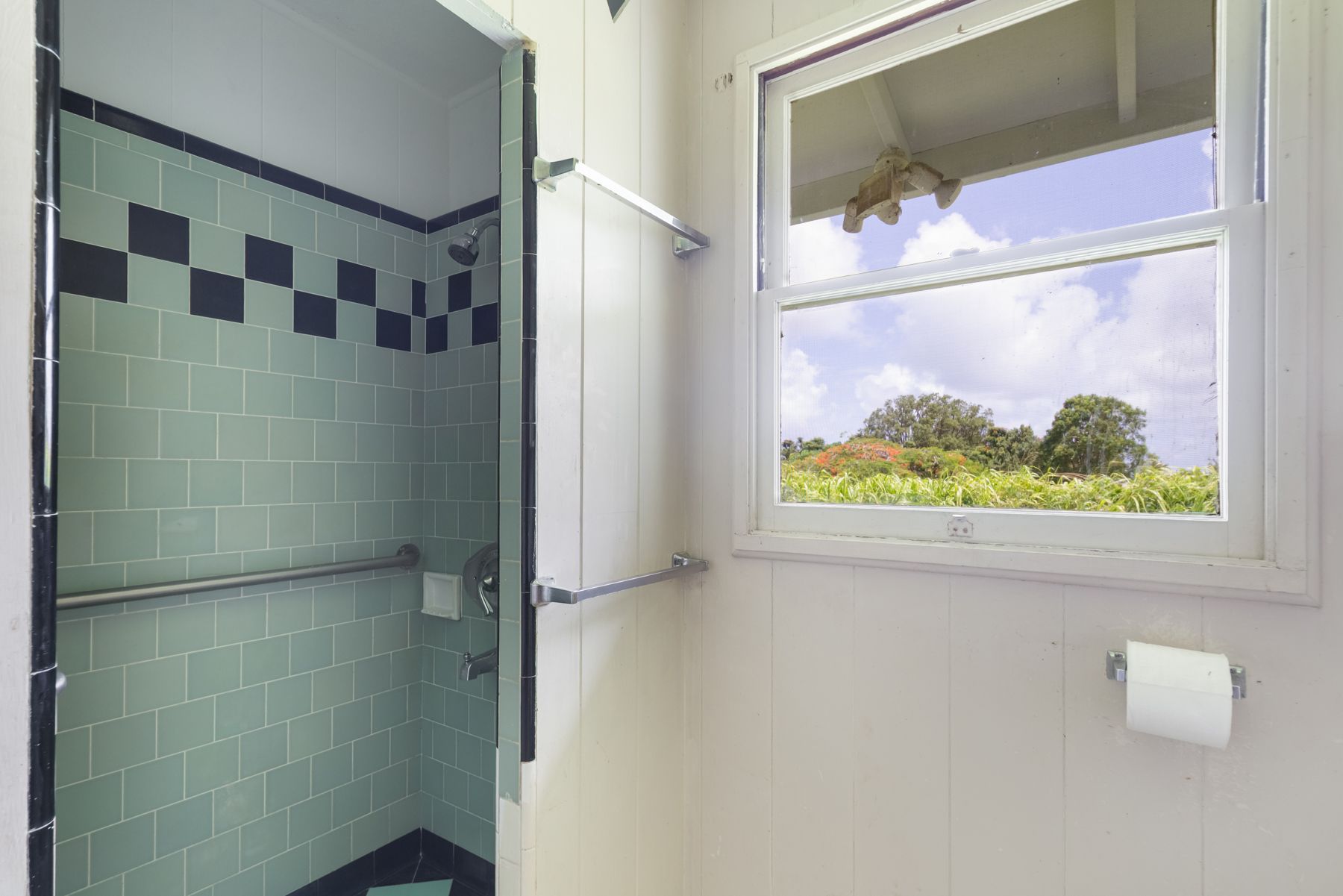 6151 Kawaihau Road Kapaa, HI 96746 - Photo 26 of 30 a bathroom with a window and a shower