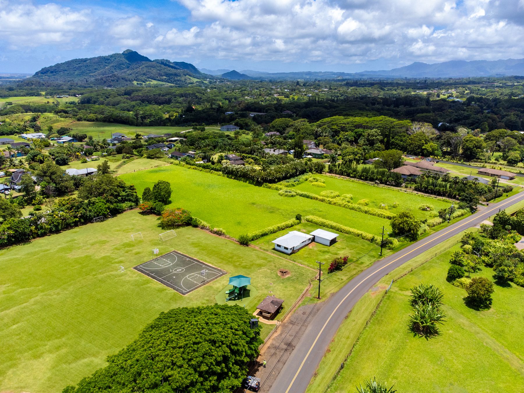 6151 Kawaihau Road Kapaa, HI 96746 - Photo 3 of 30 an aerial view of a residential houses with outdoor space