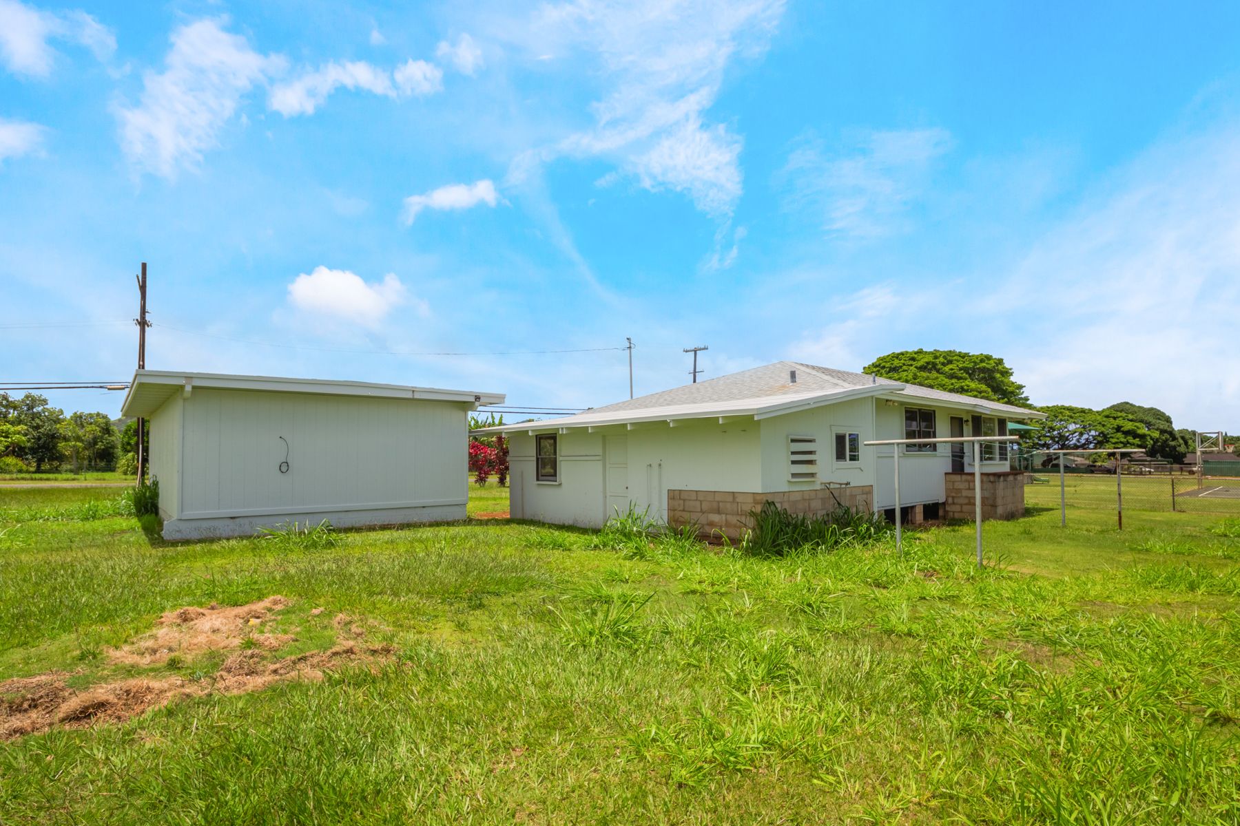 6151 Kawaihau Road Kapaa, HI 96746 - Photo 8 of 30 a front view of a house with a yard