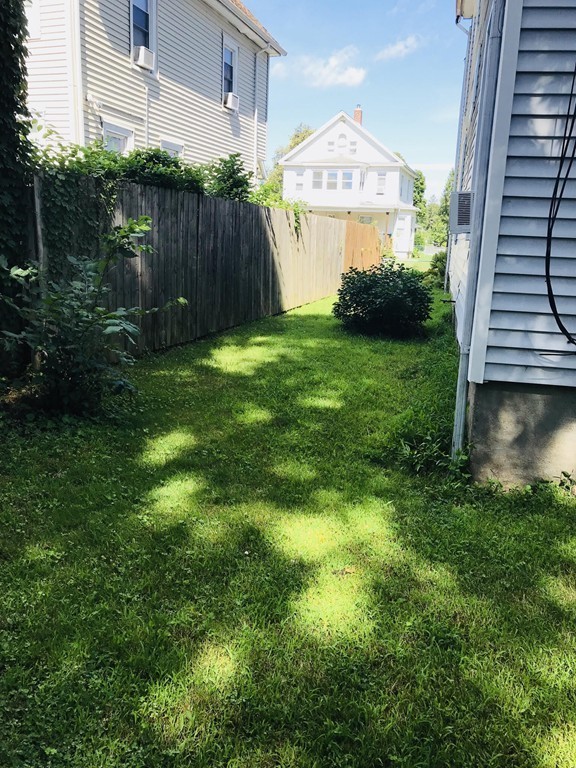 99 Hall Street Springfield, MA 01108 - Photo 5 of 10 a view of a back yard