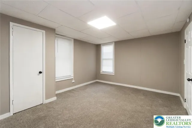 an empty room with windows