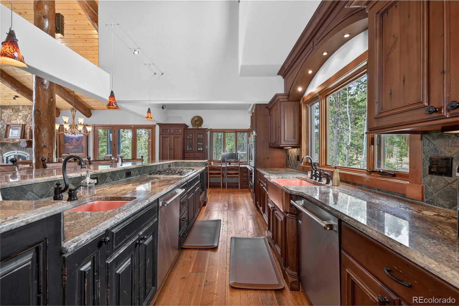 148 County Road Tabernash, CO 80478 - Photo 20 of 45 a kitchen with lots of counter space and a sink