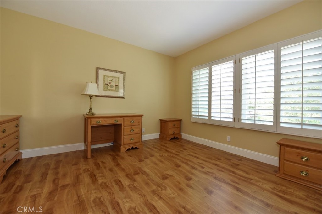 12 Brigadier Irvine, CA 92603 - Photo 48 of 50 a view of a room with wooden floor and furniture