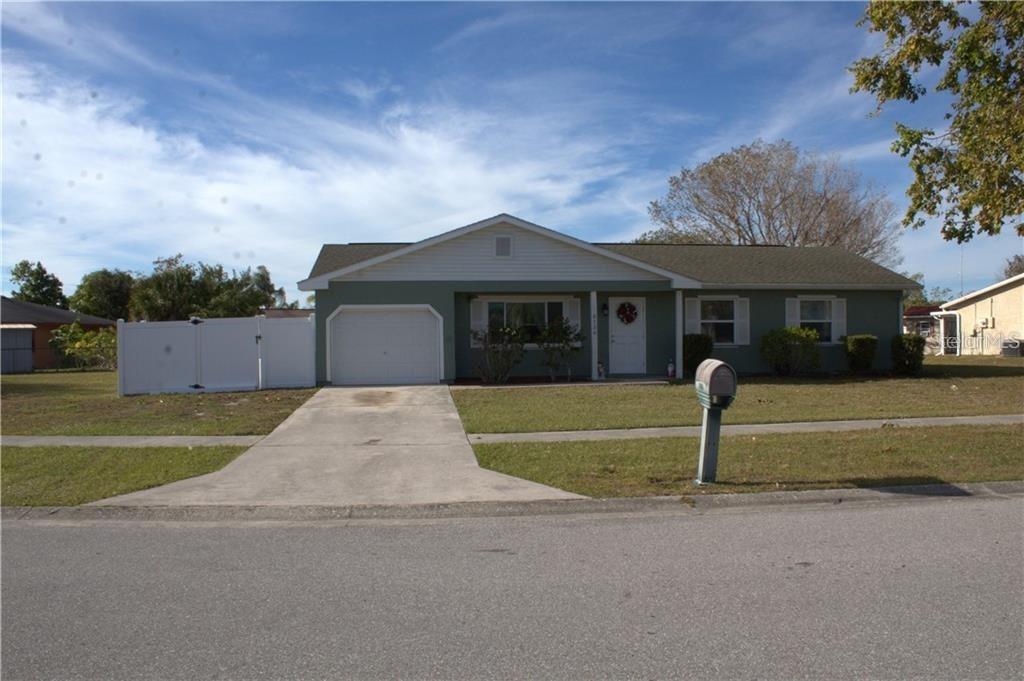 6138 Myrtlewood Road North Port, FL 34287 - Photo 1 of 1 a front view of a house with a garden