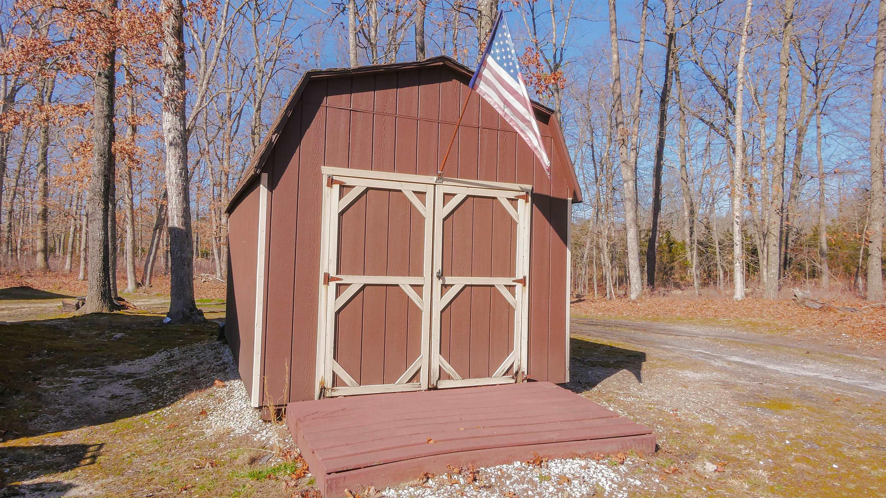 337 Broad Street Milmay, NJ 08330 - Photo 36 of 36 a view of a door with a house